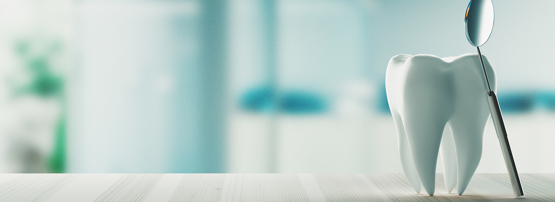 The image shows a close-up view of a white toothbrush with bristles against a blurred background, which appears to be a room with a blue hue.
